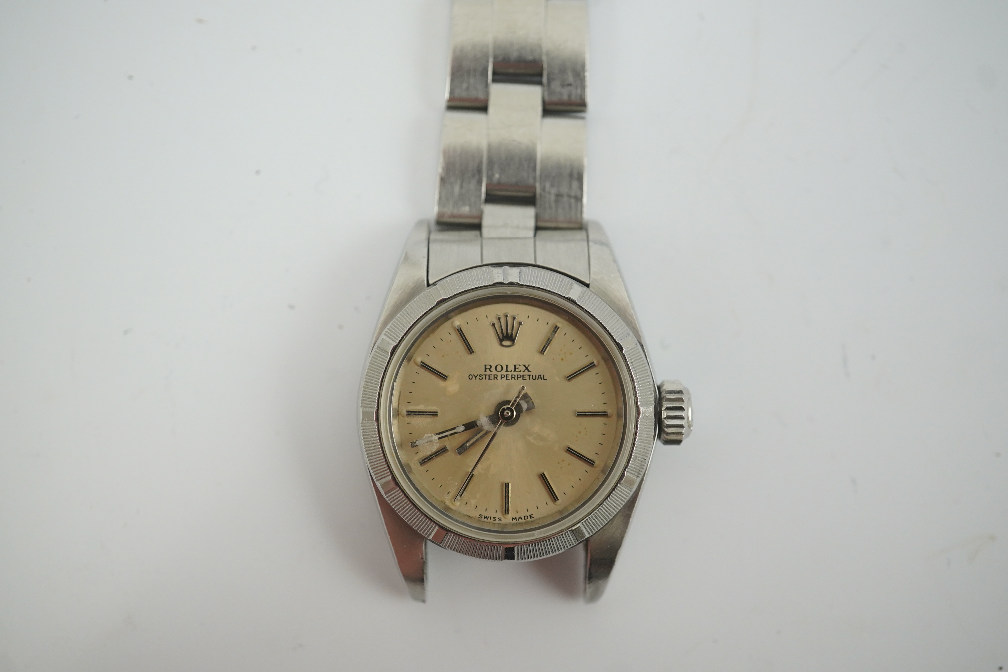 A lady's 1990's stainless steel Rolex Oyster Perpetual wrist watch, on a stainless steel Rolex bracelet